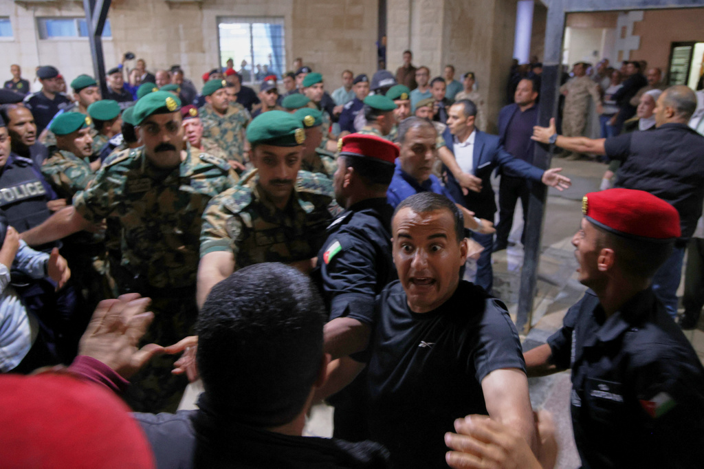 7 dead and dozens injured after gunman opens fire at a church in Jordan