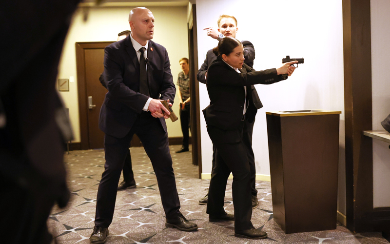 Shots fired as gunman charges toward ballroom at White House correspondents' dinner. Trump unharmed