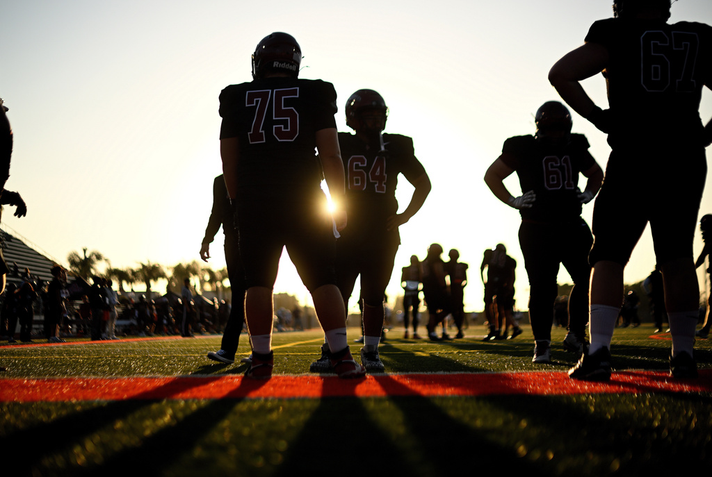 Small colleges are starting football programs, hoping to boost enrollment