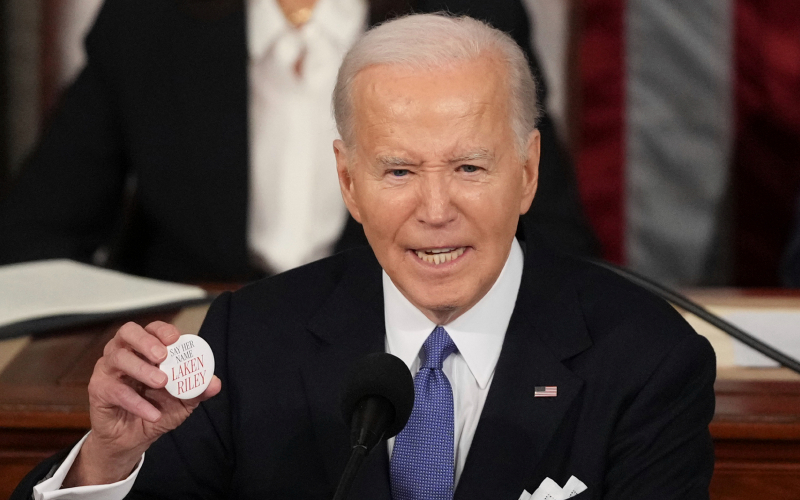 Button-holding Biden hounded by his side for uttering 'illegal'