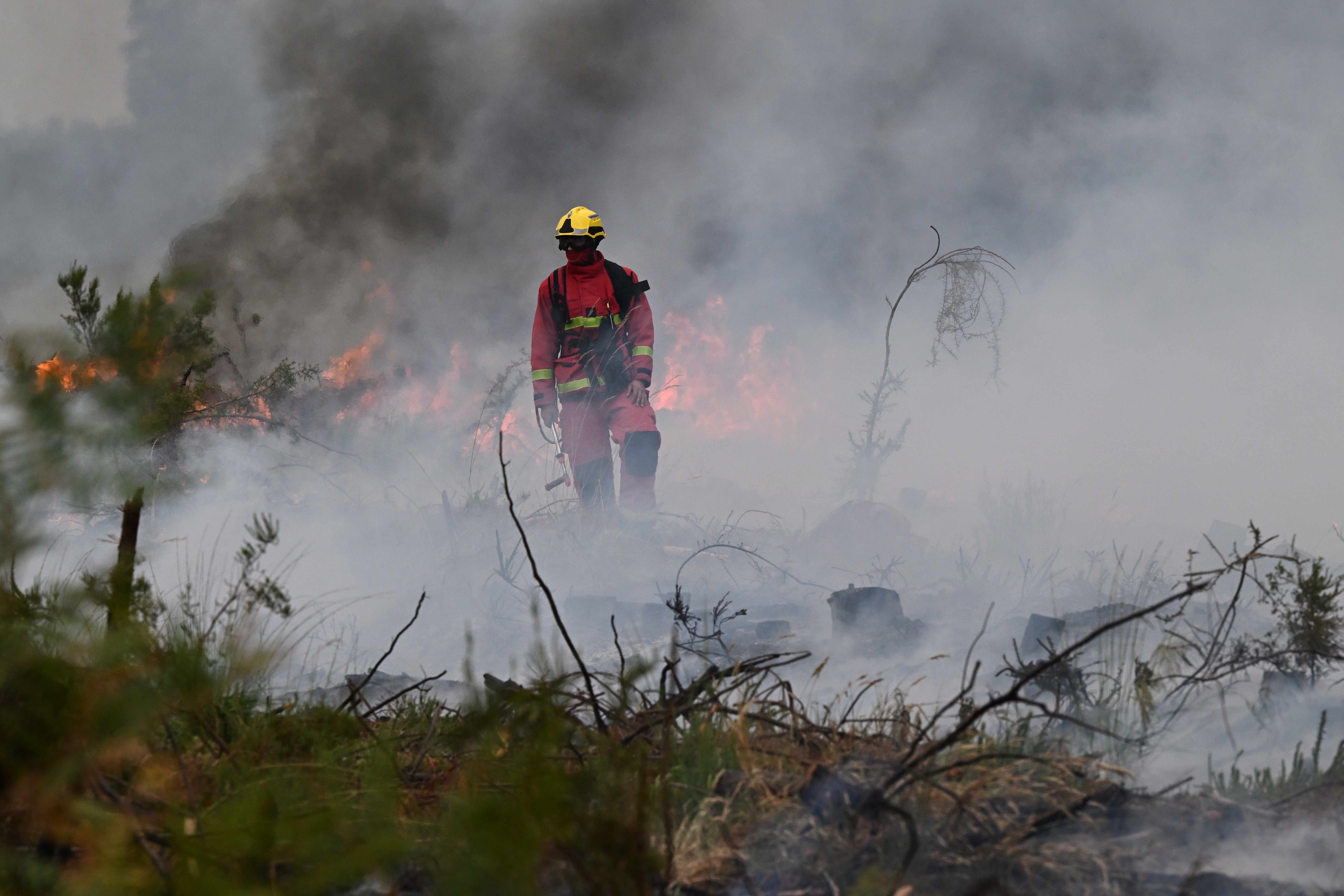Wildfires in France drive 250,000 people from their homes and creep toward wine city of Bordeaux