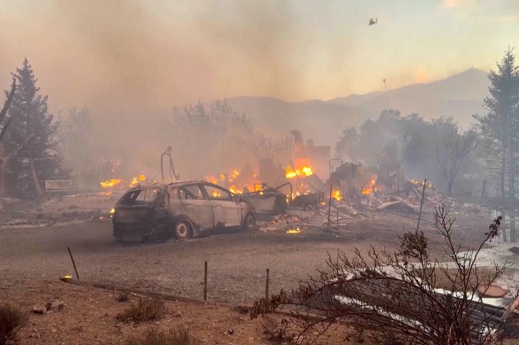 Firefighters make progress against Nevada wildfire that's destroyed more than 30 homes