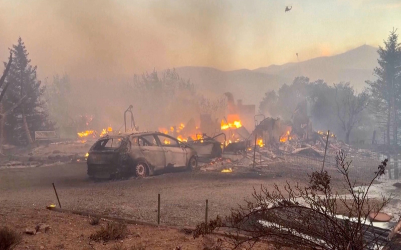 Firefighters make progress against Nevada wildfire that's destroyed more than 30 homes