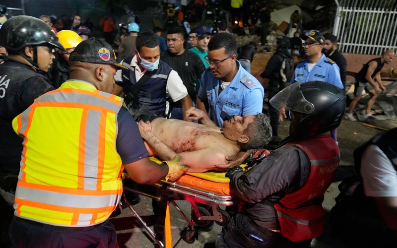 At least 164 dead and 971 injured after powerful quakes rock Venezuela, acting president says