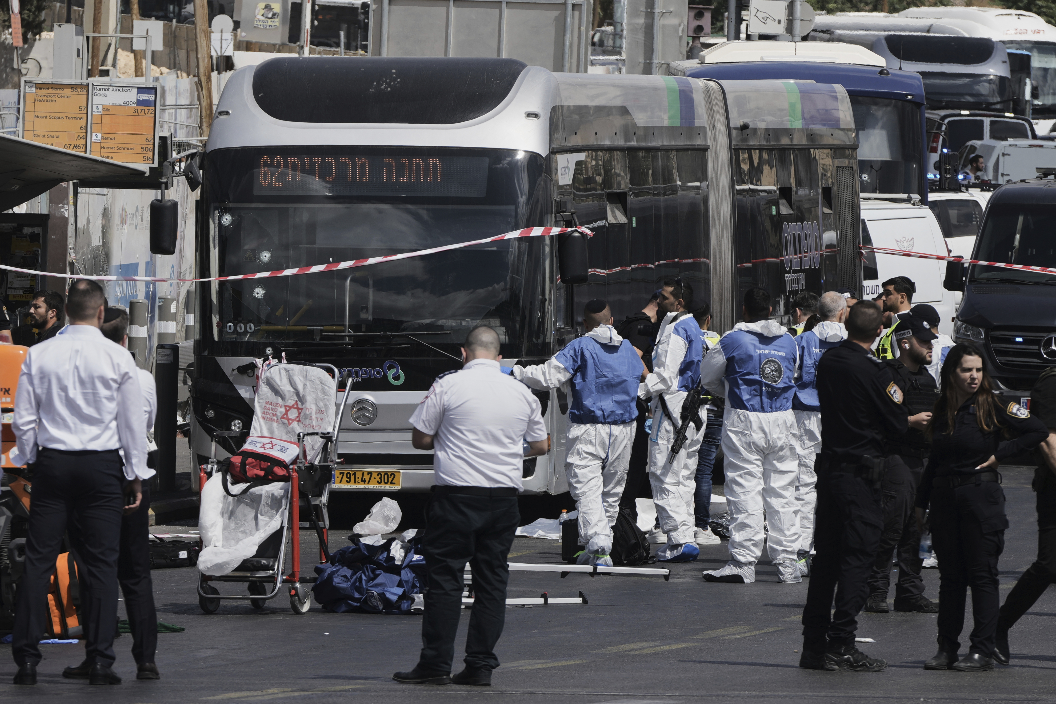 At least six dead after Palestinian terrorists attack bus stop in Jerusalem