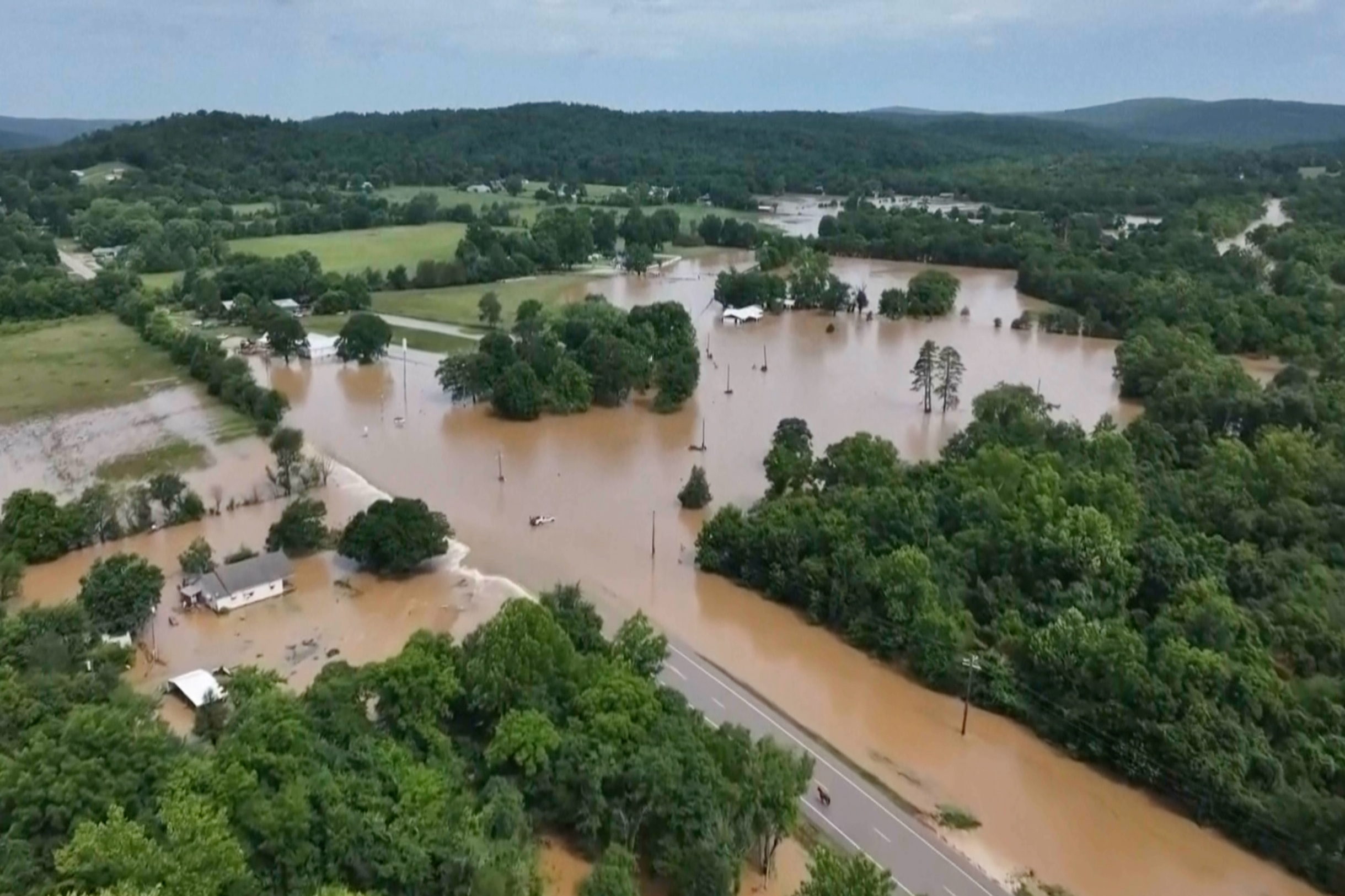 More than 200 people at a summer camp helicoptered to safety as Missouri faces flooding
