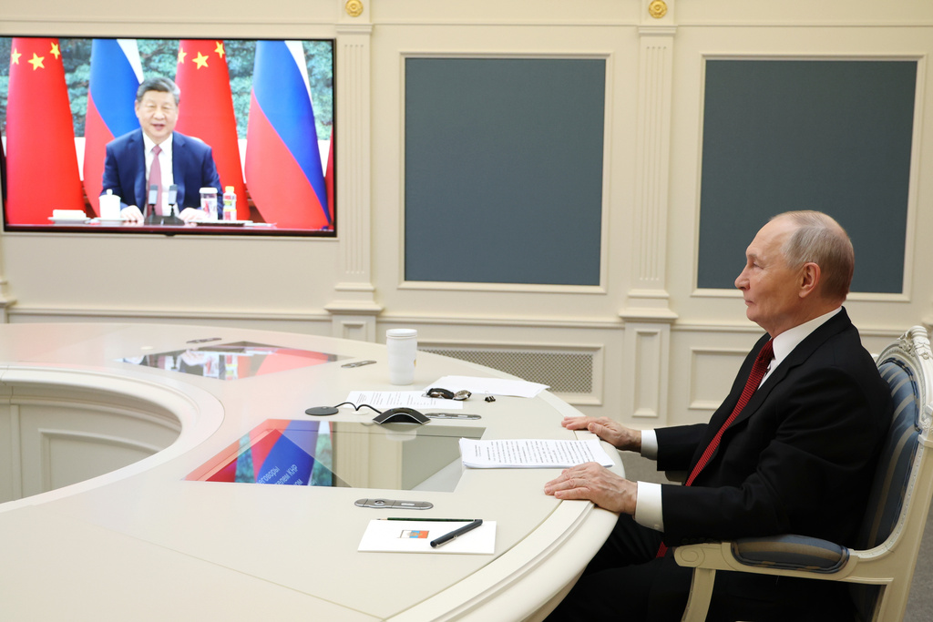 China's Xi and Russia's Putin reinforce ties in video call