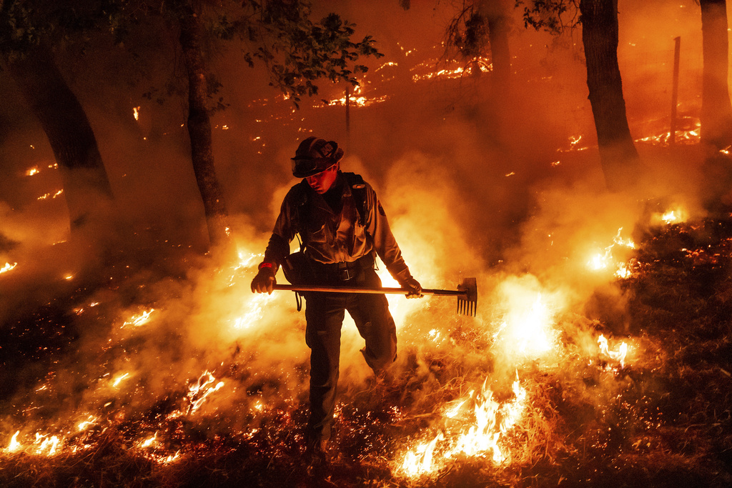 Wildfire approaches Reno, Nevada, forcing thousands to evacuate their neighborhoods