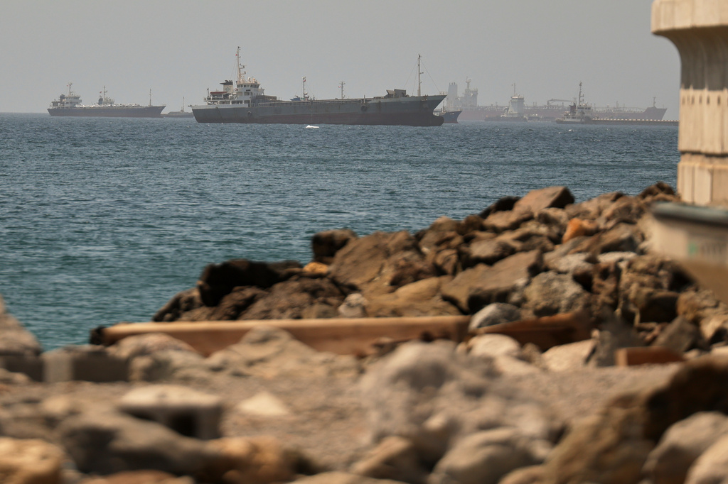 Stranded ships have begun transiting the Strait of Hormuz