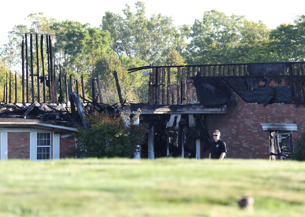 Death toll from attack at Michigan church stays at 4 after police sweep charred ruins
