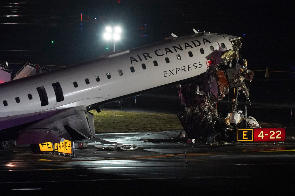 Pilot and co-pilot killed after jet collides with fire truck on LaGuardia runway