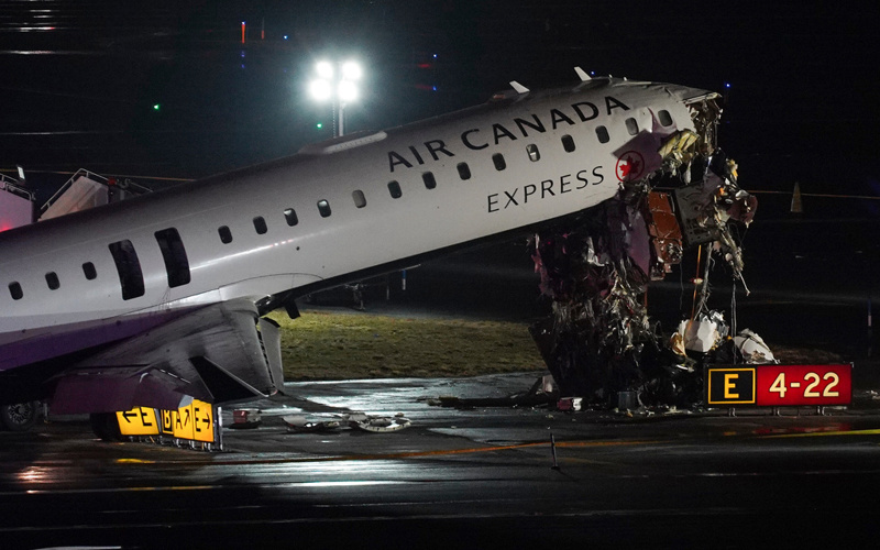 Pilot and co-pilot killed after jet collides with fire truck on LaGuardia runway