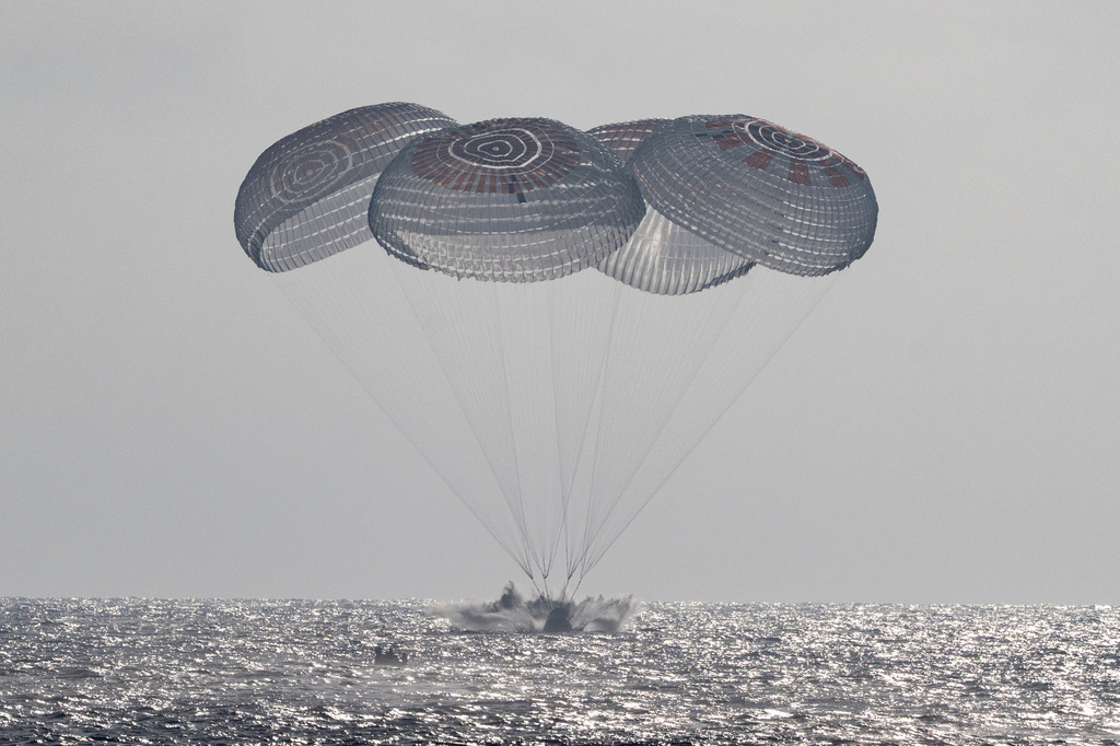 Four astronauts return to Earth after eight months in space
