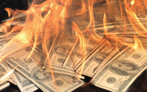 Spending money on rap camp when kids can't read or write? Education watchdog says that's not right