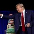 Trump marks his 78th birthday with a towering 'MAGA' cake and attacks on his 81-year-old rival's age