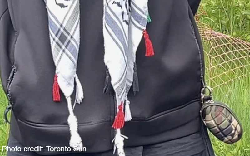 Anti-Israel protester allowed to taunt marchers with fake hand grenade