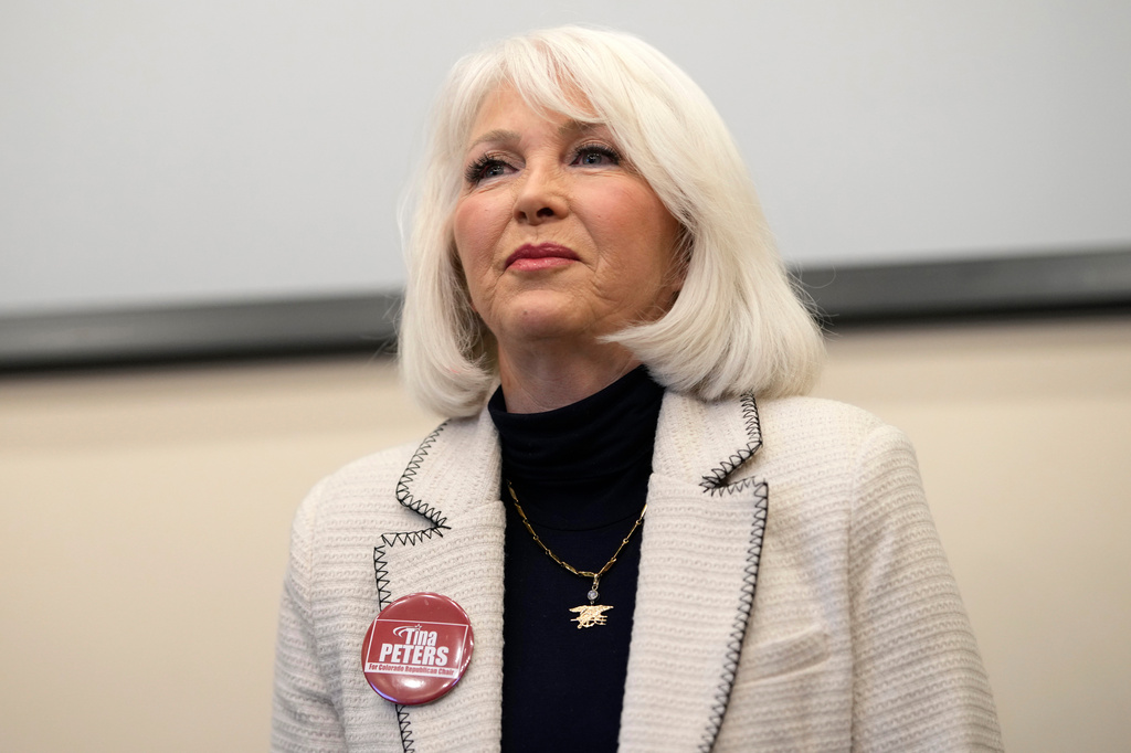 Colorado elections clerk released from prison after governor commutes sentence