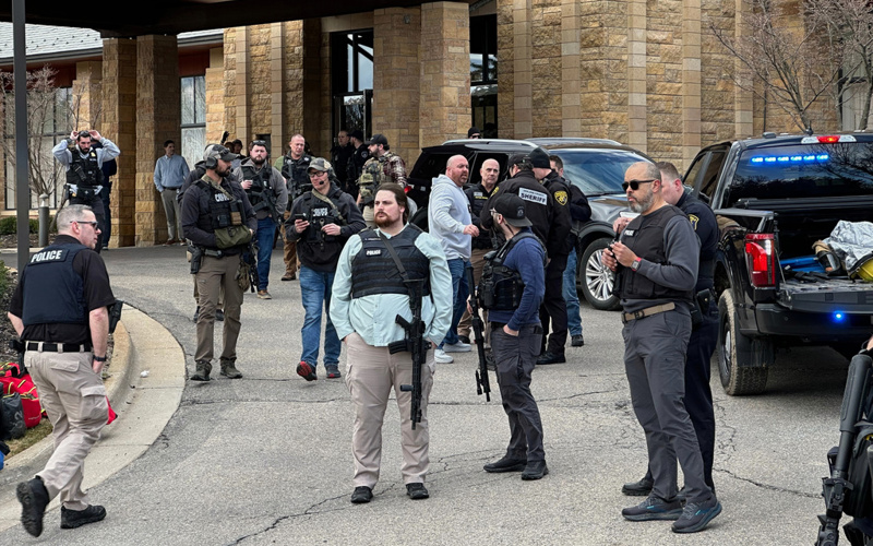 Armed man rams vehicle into Michigan synagogue and then was fatally shot by security