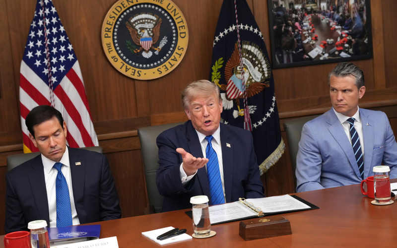 Trump hails a 'unique' Cabinet meeting at Camp David as he seizes on Spain's migration crisis
