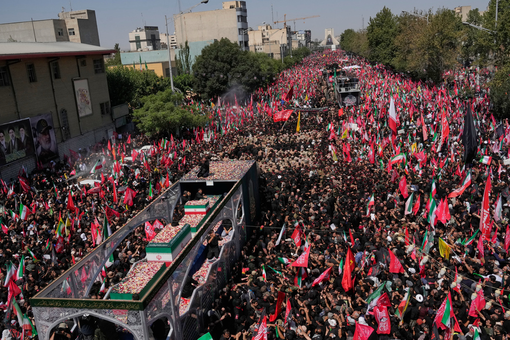 Thousands line Tehran streets for funeral of Iran's Supreme Leader