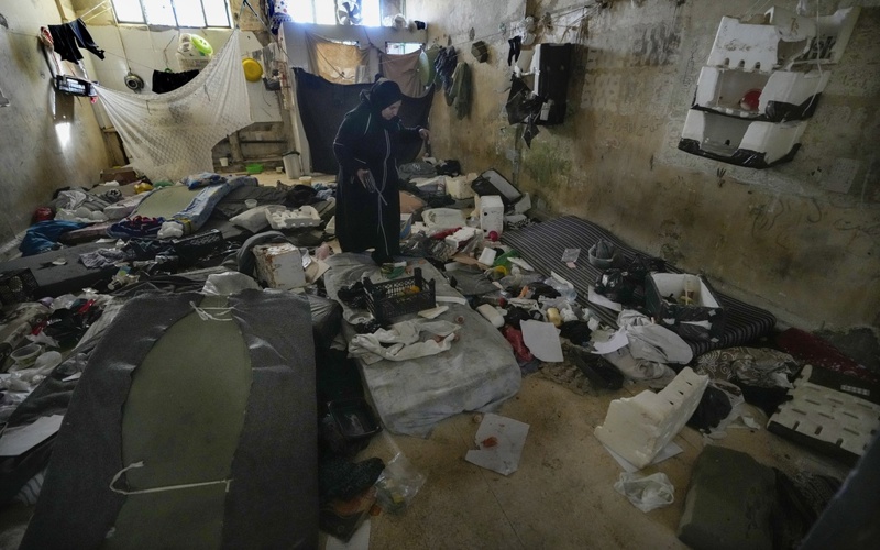 Thousands scour Syria's most horrific prison in search for loved ones