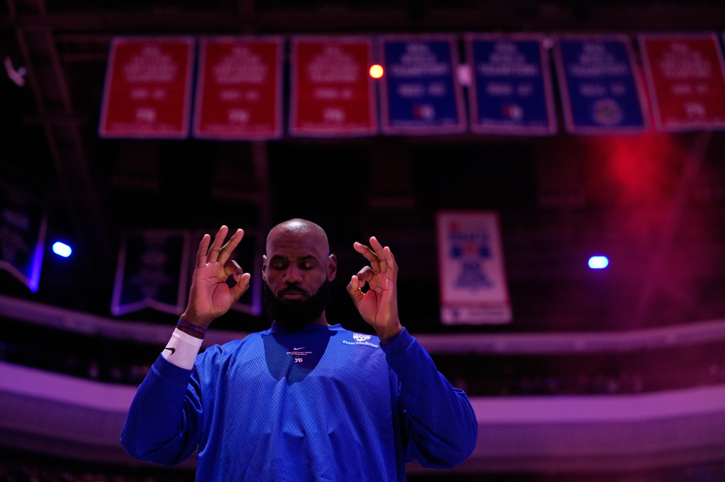 Trump blasts 76ers star LeBron James as 'disgrace' for not standing still during national anthem
