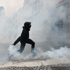 More than 400,000 protest across France, challenging Macron as Paris clashes erupt